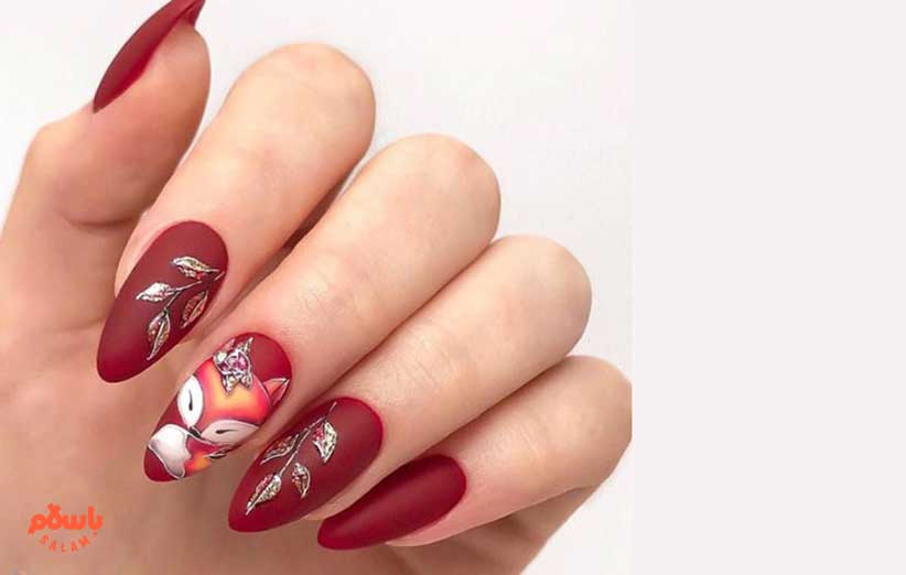 طراحی ناخن پاییزی با لاک زرشکی